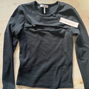 BCBG black long sleeve cutout top.  Never worn.